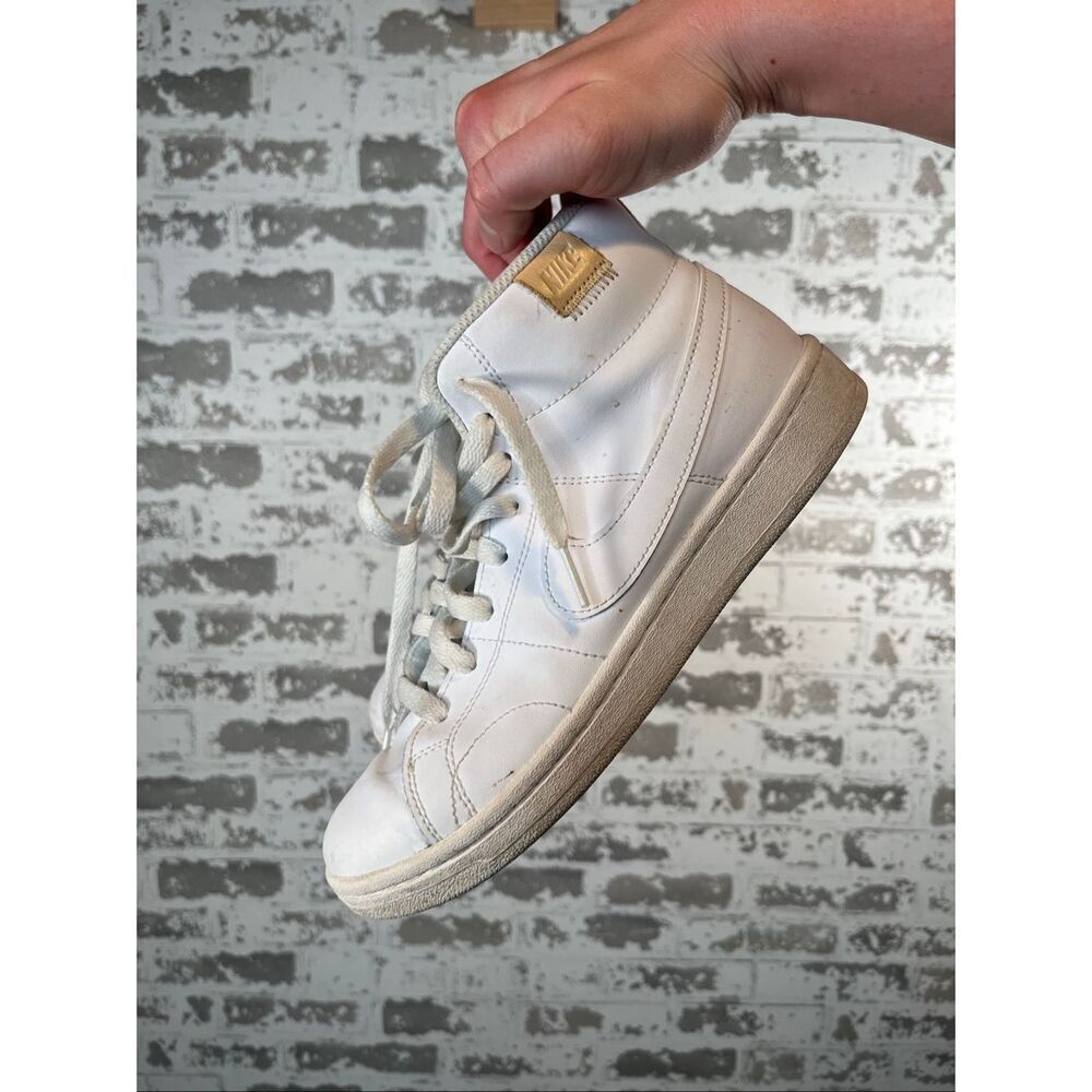 Nike | women white leather high top shoes